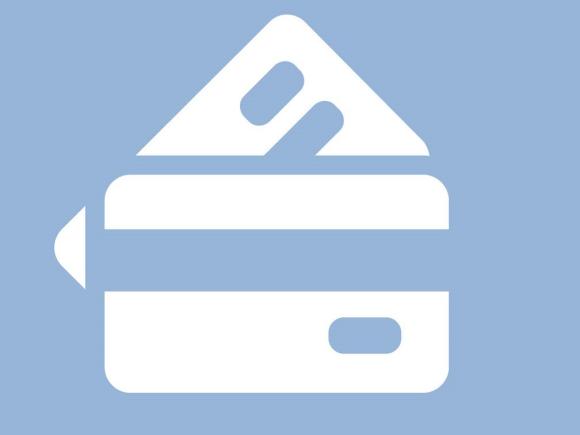 Icon image of credit cards on light blue background.