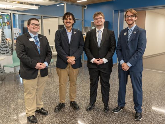 Group of SGA members smiling.