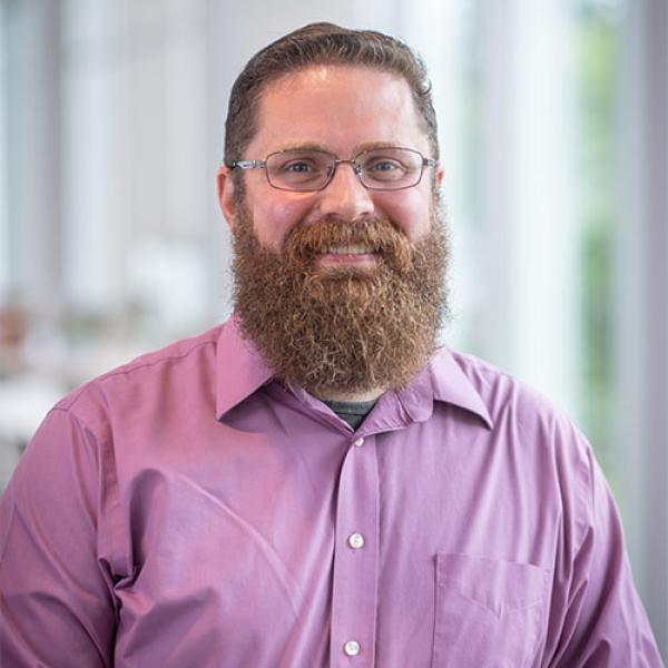 Mathematics Department Chair Jesse Johnson smiles at the camera.