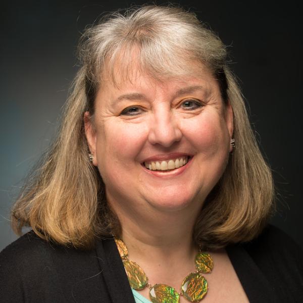 Headshot of Karen Sladyk smiling.