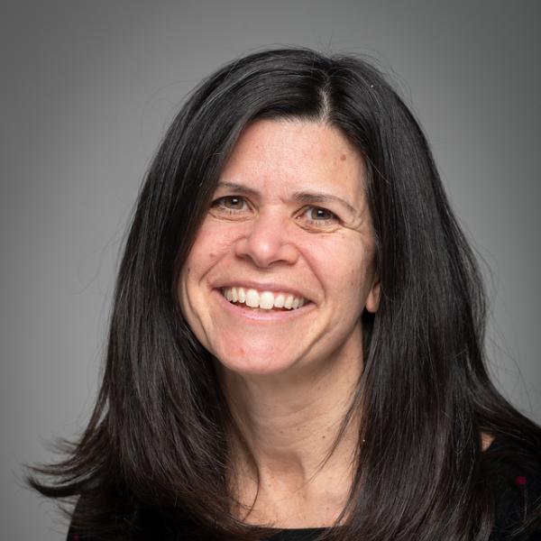 Headshot of Catherine Savini.